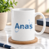 White Anas personalized name mug with blue lettering and decorative design