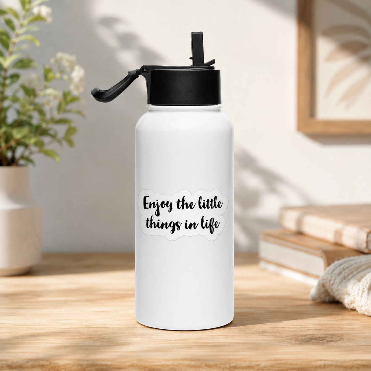 Enjoy the Little Things in Life inspirational quote design in black handwritten lettering on white background