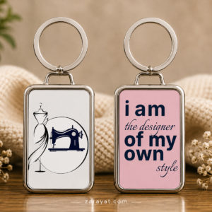 Fashion designer keychain with sewing machine and dress form design