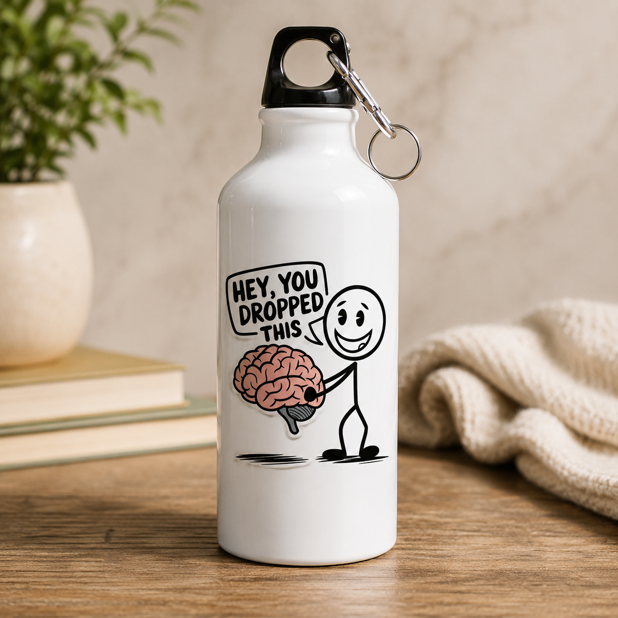 White funny brain water bottle with “Hey, You Dropped This” graphic and smiling stick figure