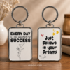 Inspirational keychain with success and believe in your dreams messages
