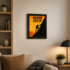 Never Give Up motivational wall art featuring a mountain climber in a black frame