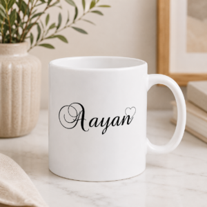 White personalized Ayaan name mug with elegant black lettering and heart design