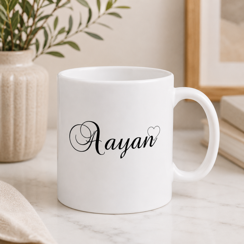 White personalized Ayaan name mug with elegant black lettering and heart design