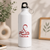 Taha name water bottle with red Arabic calligraphy and TAHA lettering on a white bottle
